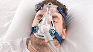 man wearing a CPAP mask