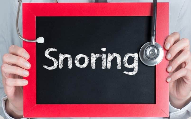 chalkboard with "snoring" written on it