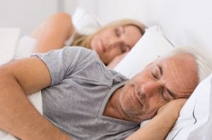 couple sleeping in bed